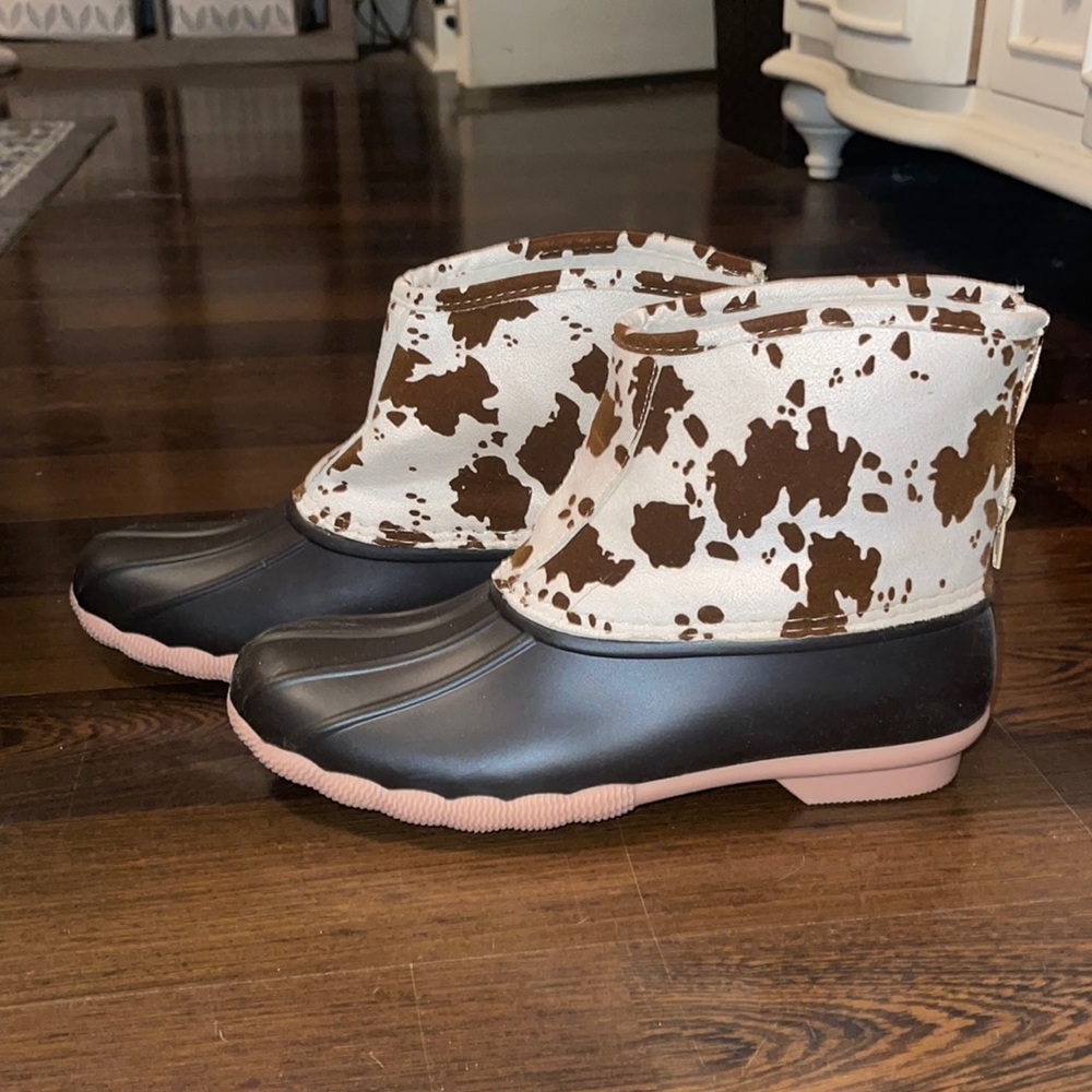 Cow print duck boots